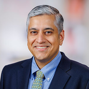 Arjun D. Law, MBBS, MD, DM, DRCPC, FRCP