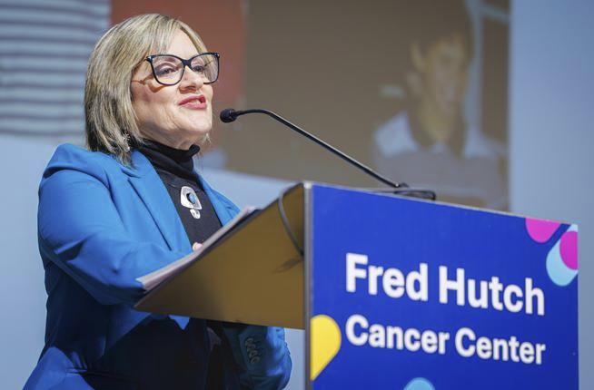 Keynote speaker Dr. Barbara Segarra-Vazquez at a podium at the Value in Cancer Care Summit held November 6 in Seattle.